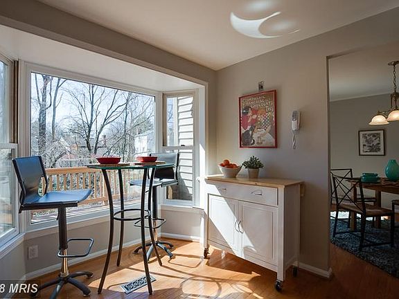 Eat-in space and views of deck and green space.