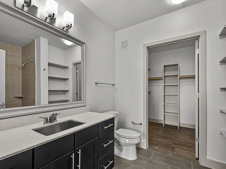 Spacious Bathroom with Walk-In Closet