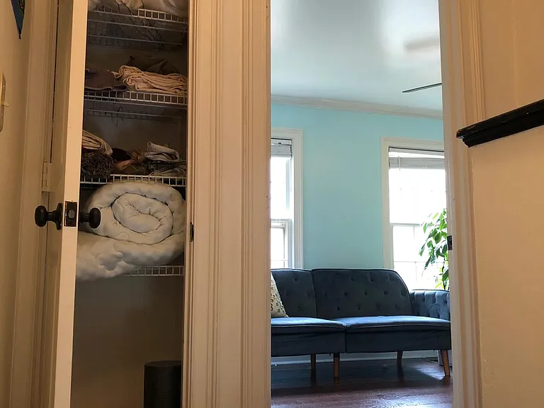 linen closet top of stairs