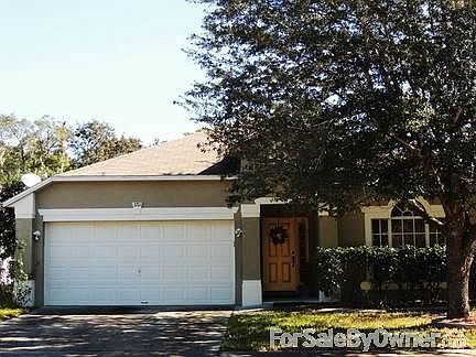 Front View
						:
						Large oak tree offers shade from the Florida sun