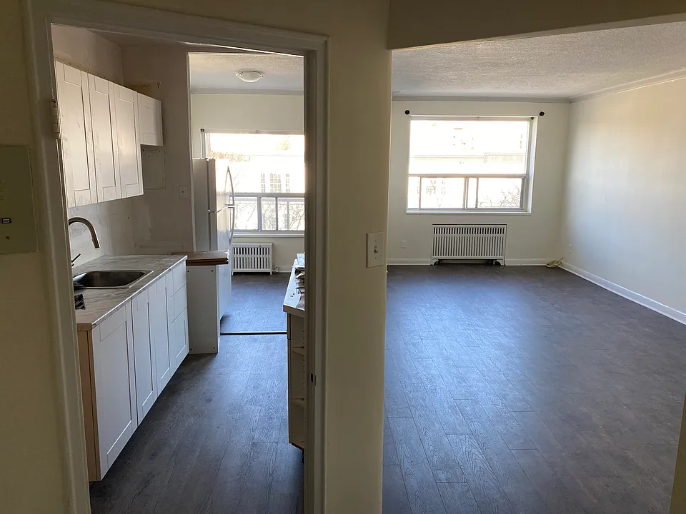 View of kitchen, dining and Living area from the front entrance.