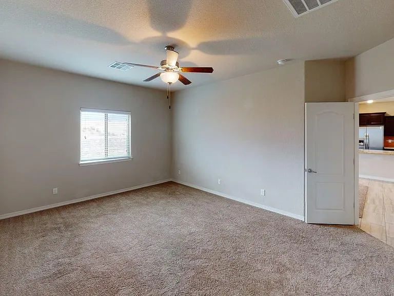 Spacious Zoned Primary Bedroom