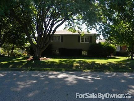 View from front of house : Attached, oversized two car garage on the right.