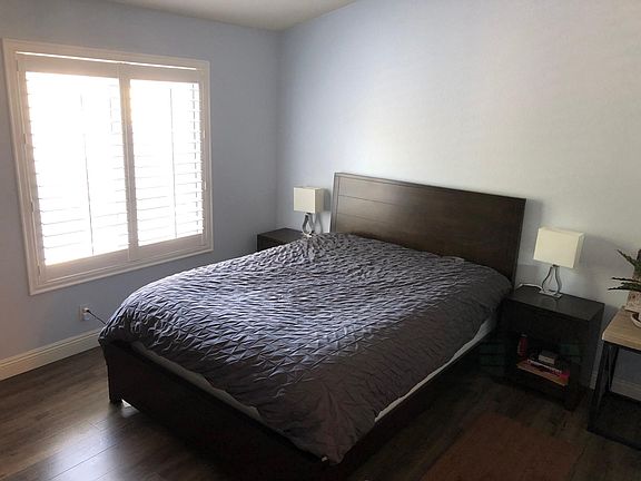 Master bedroom with vaulted ceilings and master bathroom. Easily fits a queen size bed, large dresser, and small desk. Pt 1