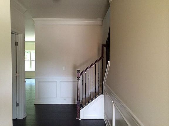 Foyer with Hidden stairs