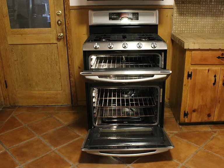 Maytag double oven range with overhead microwave