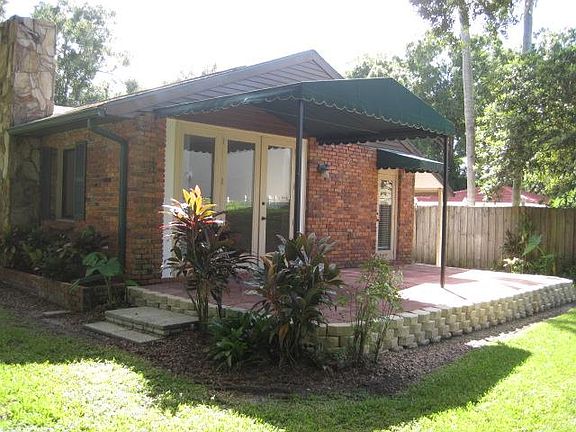 Patio faces view of Egypt Lake and view is accessible from living room and master bedroom.