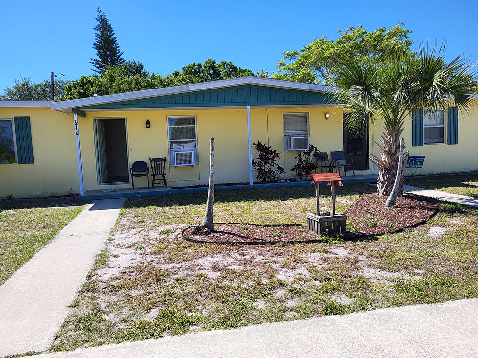 Front of house - apt on the ride side
