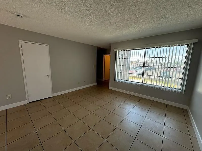Living area with fresh paint and bright lighting