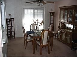 dining room with door out to extra large deck