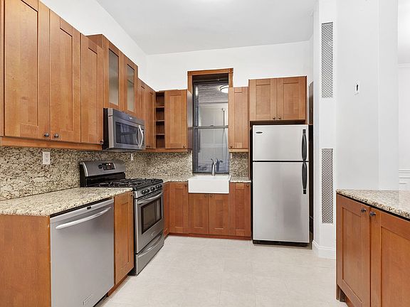 5th image of 126 E 12th St APT 1C