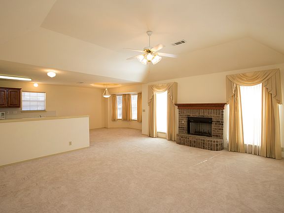 Family Room has brick gas fireplace