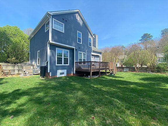 Backyard side view of house