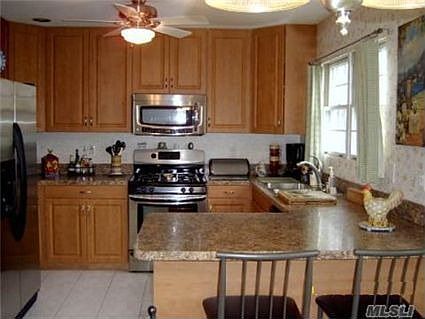 Updated Maple cabinets w/ Mica granite look