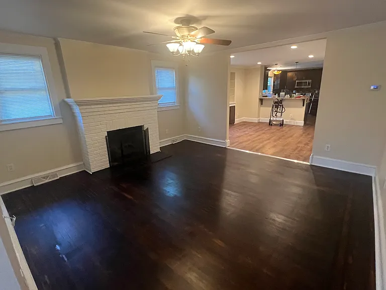 Living room (hardwood floor, ceiling fan gas fireplace)