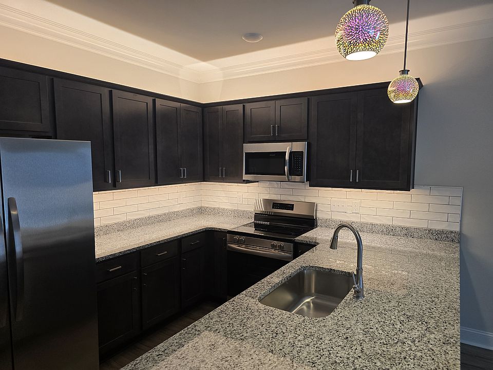 Tile Backsplash with starburst pendant lights