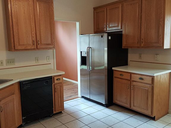 Fully Equipped Kitchen with plenty of cabinetry and counter