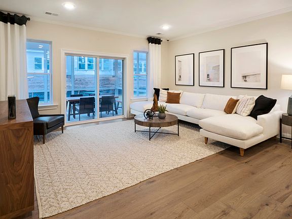 Spacious gathering area with large windows for natural light