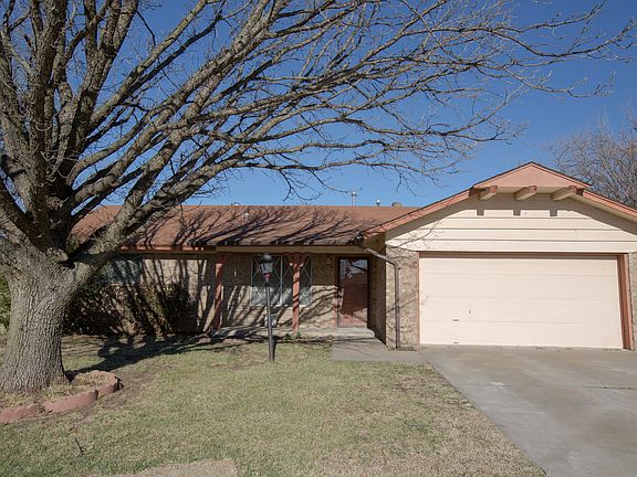Mature trees and fenced yard