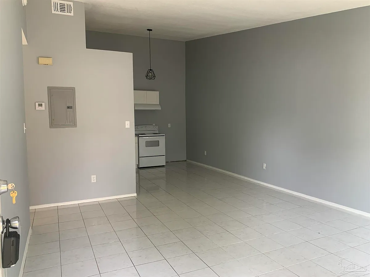 Building Photo - 6818 Tiki Ln #3