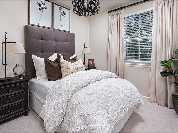 Located on the first floor, this bedroom is ideal for overnight guests with convenient access to the
