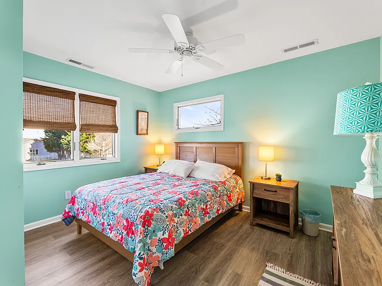 Comfortable upstairs guest bedroom with a quiet, private setting for family members or visitors.