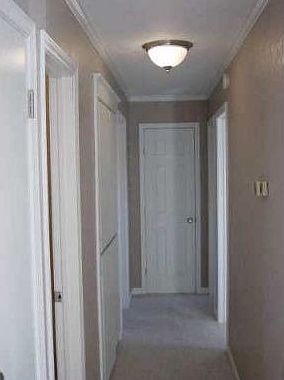  Hallway to 3 bedrooms and baths.