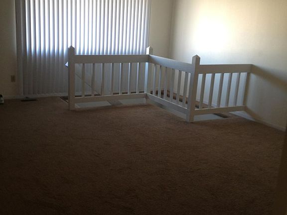 Living Room with Steps to Finished Basement