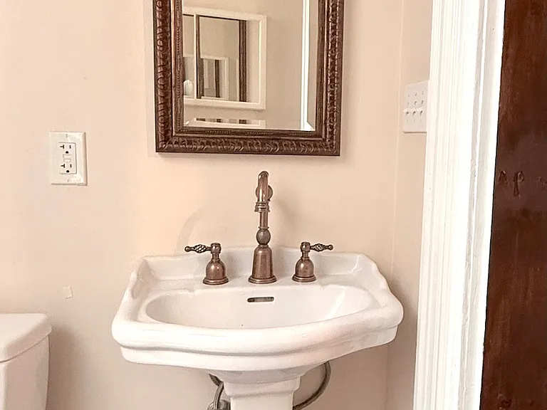 First floor powder room with natural light