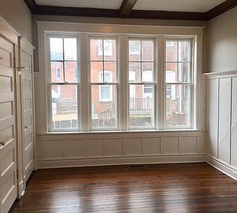 Tons of natural light! Living room has beautiful details