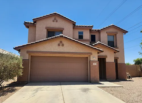 5931 W Albeniz Pl Photo 1