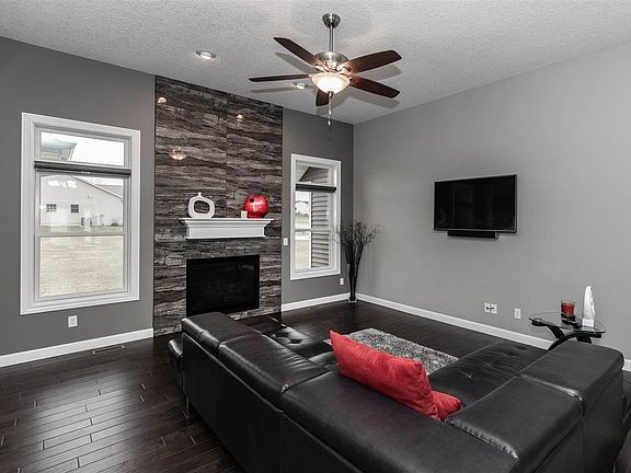Floor to ceiling marble fireplace