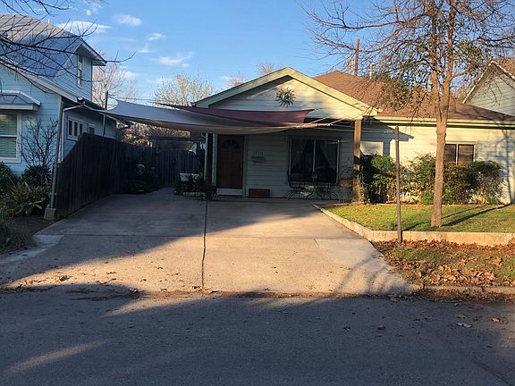 Two, covered off street parking spaces