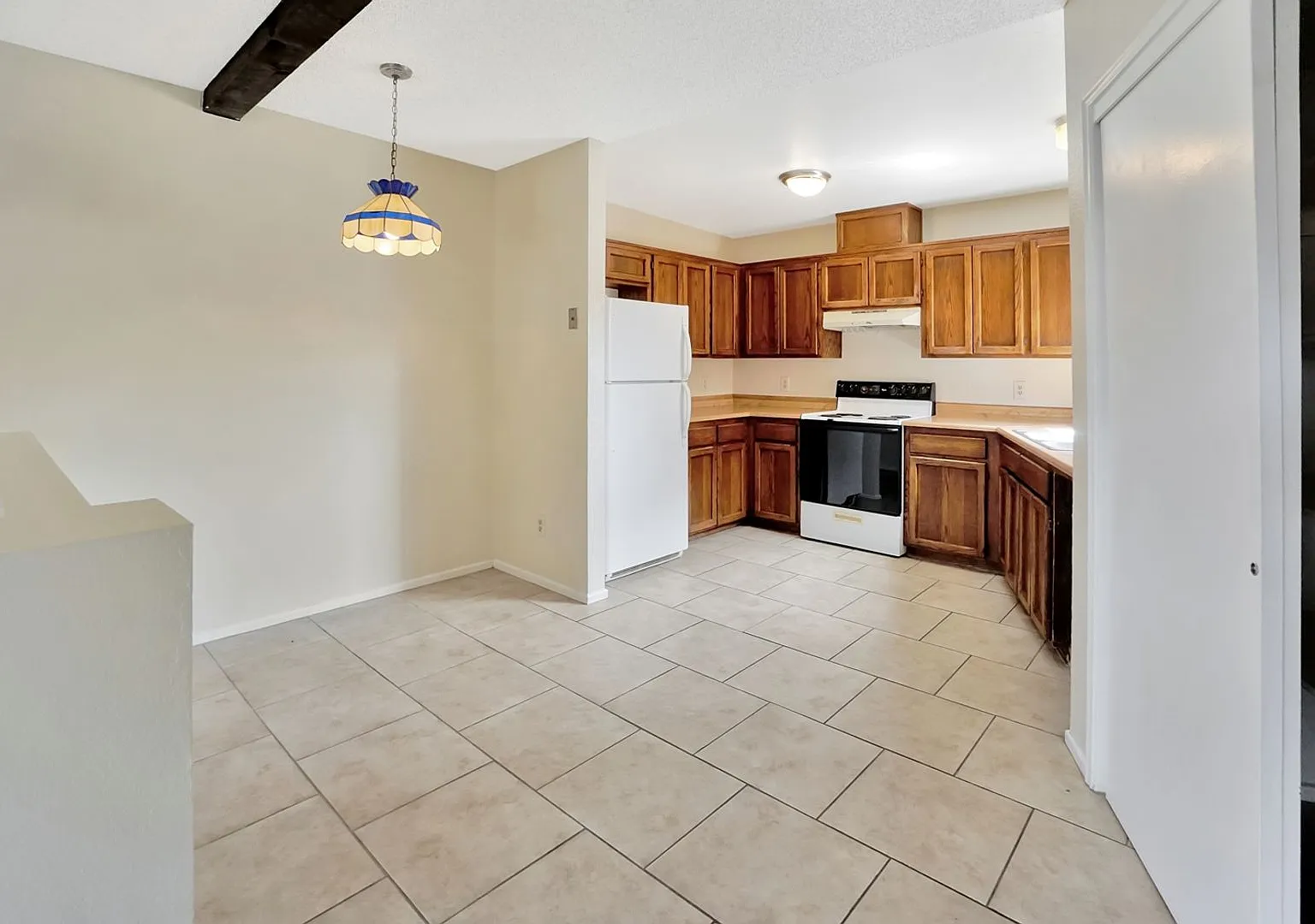 Pending/ Rented - Midtown Sanctuary: Bright 2BR Home with Private Fenced Backyard — Photo 2