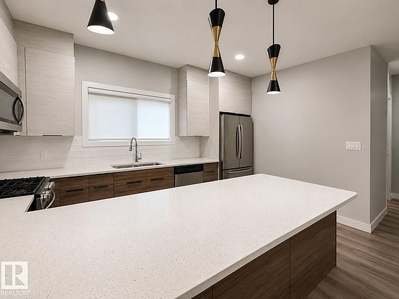 5th image of 8021 87th St NW