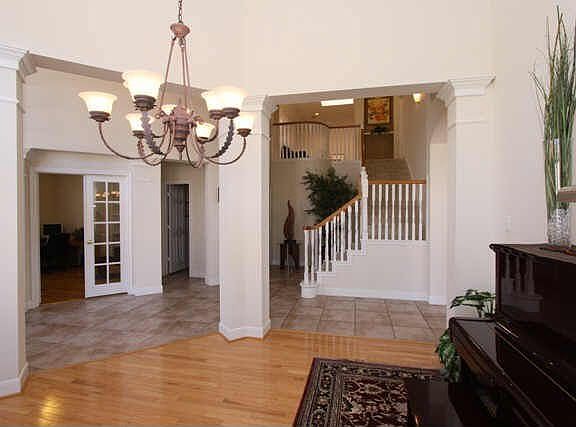 Formal dining overlooking hallway