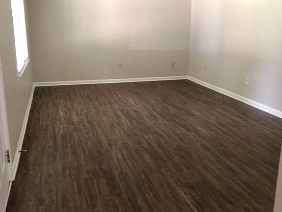 another photo of the living area taken from the kitchen