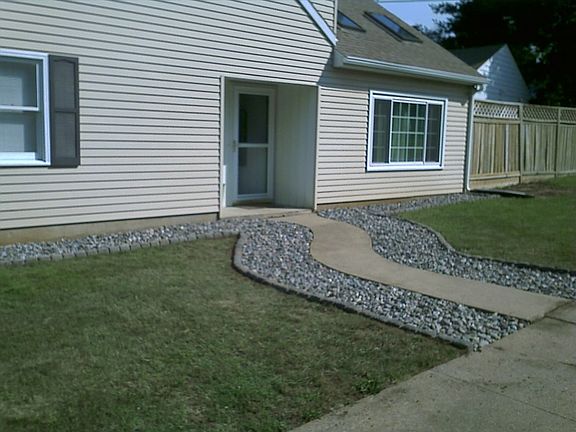New Roof, doors, and rock garden.