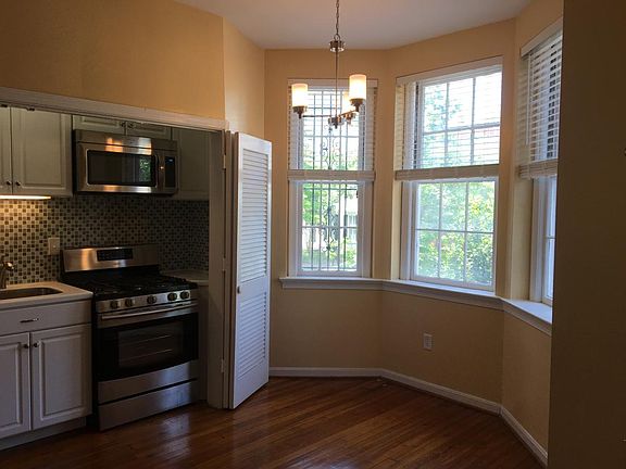 Kitchen w/ front windows