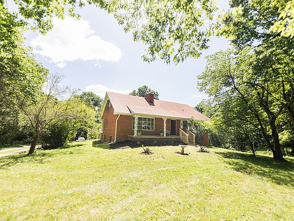 Beautiful setting among the trees at the end of a long lane