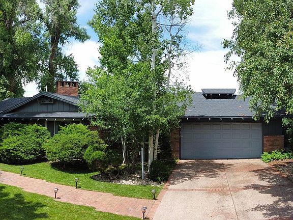 Front of house showing driveway and garage (which would be your private entrance)