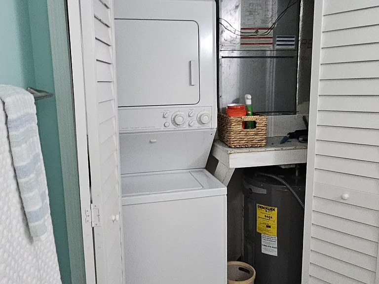 washer and dryer in guest bath