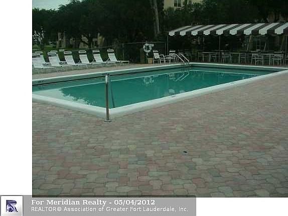 5th image of 9450 Poinciana Pl APT 411