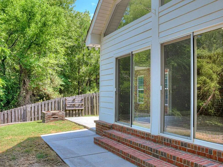 Sunroom view with double glass doors
