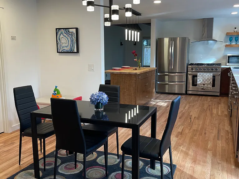 Dinning room with designer lights.