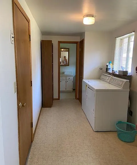 Coming in from the garage you turn left to the laundry room and 1/2 bath