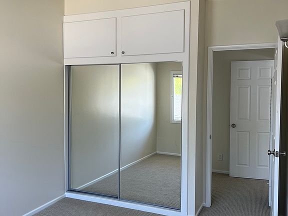 Mirrored Wardrobe Doors in Bedroom