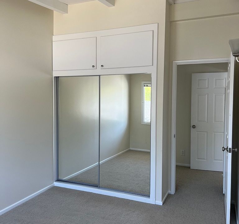 Mirrored Wardrobe Doors in Bedroom