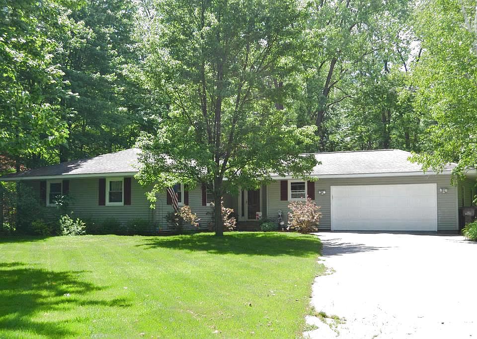 Larkin Twp. ranch with 3 bedrooms nestled on a generous sized lot.  The home features an open floor plan with plenty of wood flooring and vaulted ceilings.  The kitchen has an island with updated Hickory cabinets, newer appliances and a large walk in pantry. The Living room is spacious with a gas fireplace and access to the backyard.  Huge tiered deck that leads to a patio area.  Perfect for enjoying the country setting.  The main floor laundry has storage cabinets and a folding counter.  Plenty of storage spaces through out the home.  This is a rare find.  Make your appointment today.