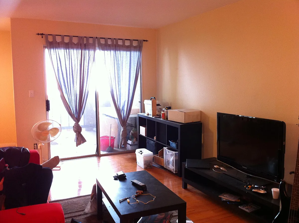 Living room with large balcony - 355 S Madison Ave #217